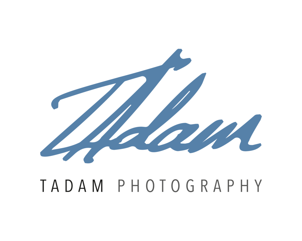 Logo of Tadam Photography featuring stylised text in blue and black.